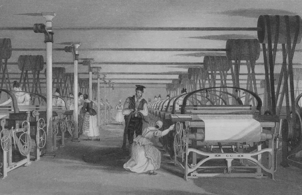 Bir pamuk fabrikasında sıralar halinde mekanik dokuma tezgâhları ve başlarında çalışan işçiler, 1835 tarihli gravür